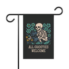 Garden flag with a skeleton and flowers design and 'All Ghosties Welcome' text on a black background.