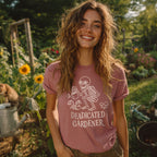 Woman wearing a 'Deadicated Gardener' t-shirt in a garden setting