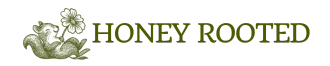 Logo of 'Honey Rooted' with a stylized plant design on a white background