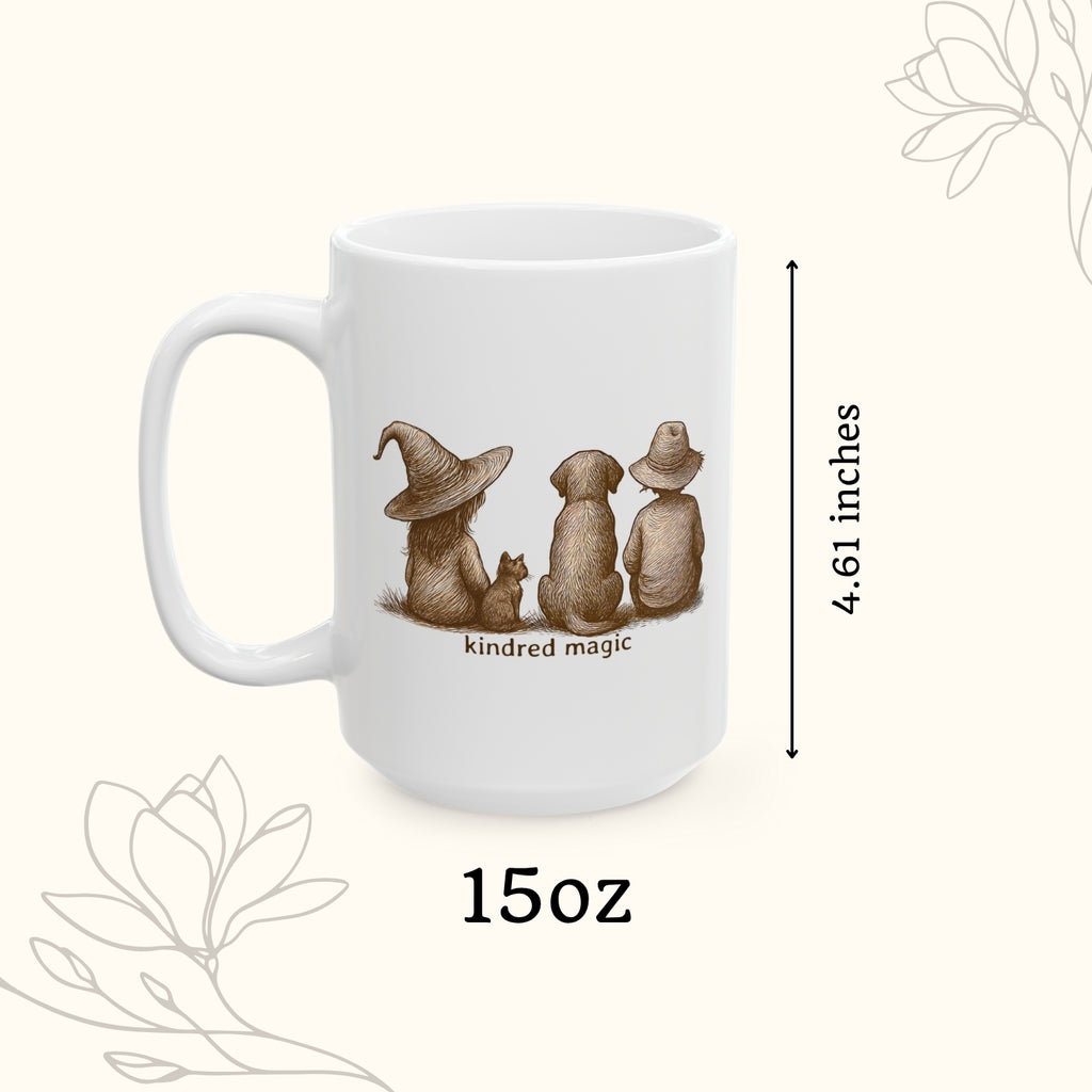 White mug with illustrations of three animals and text 'kindred magic', size 15oz, height 4.61 inches.